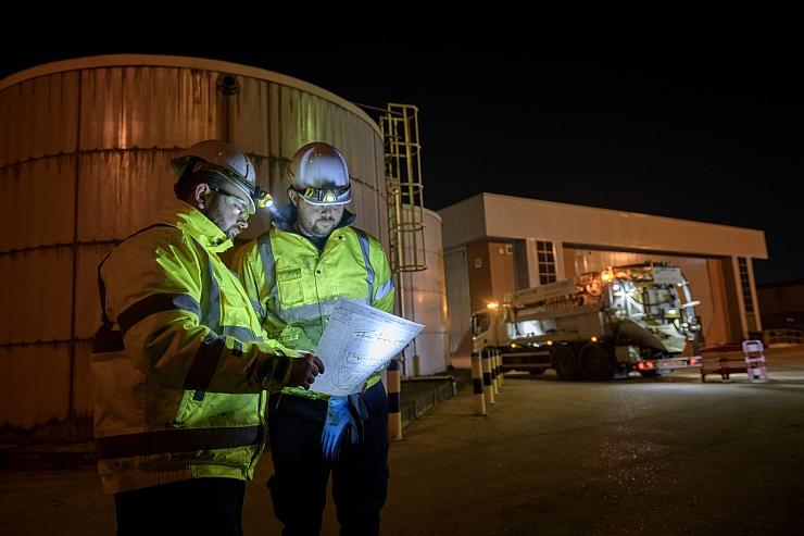 Two Metcor Engineers checking drainage plans for PPM